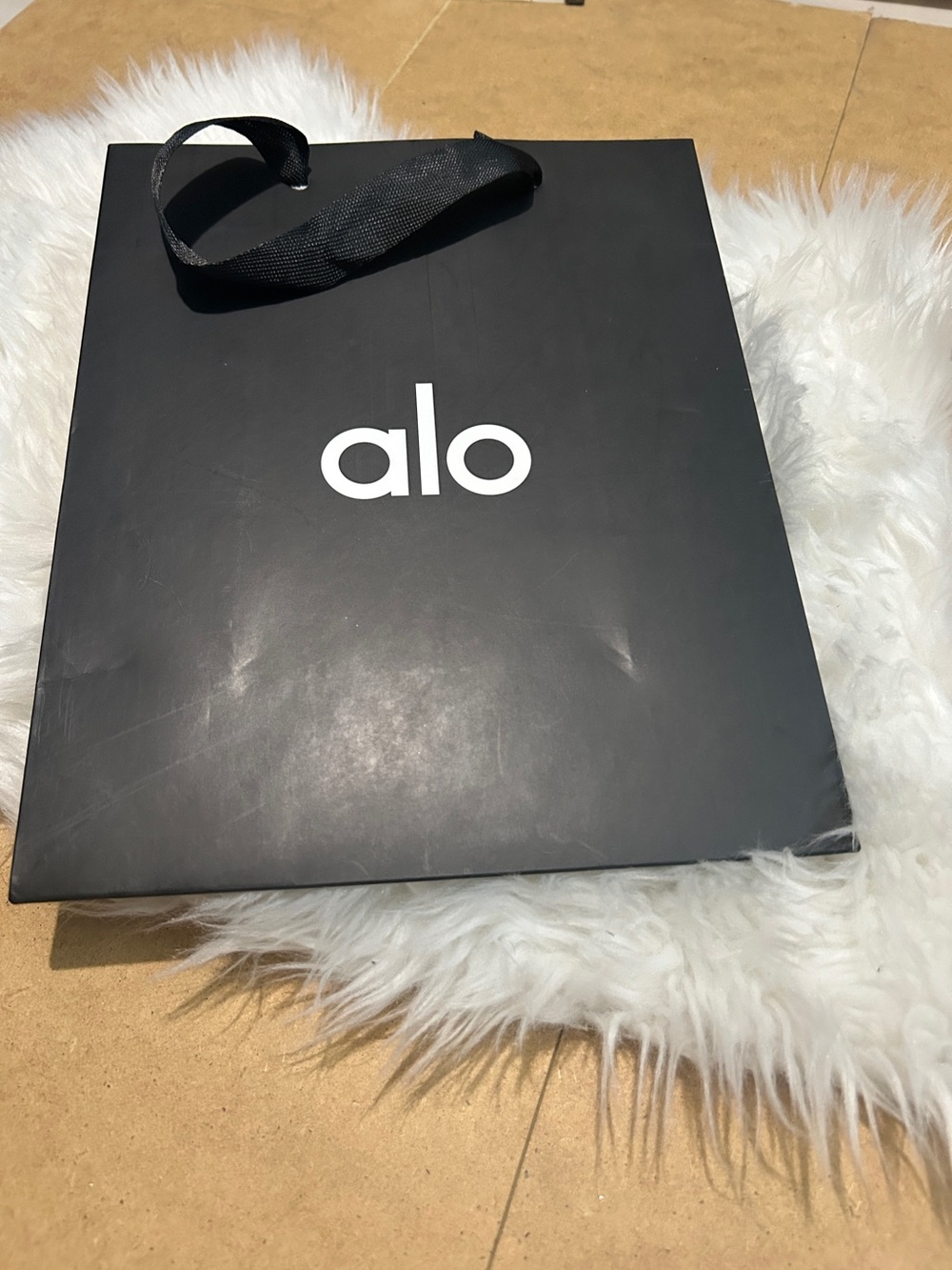 ALO Yoga black paper shopping bag 8”x10”